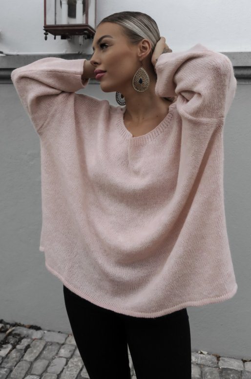 Pull en laine de couleur rose clair